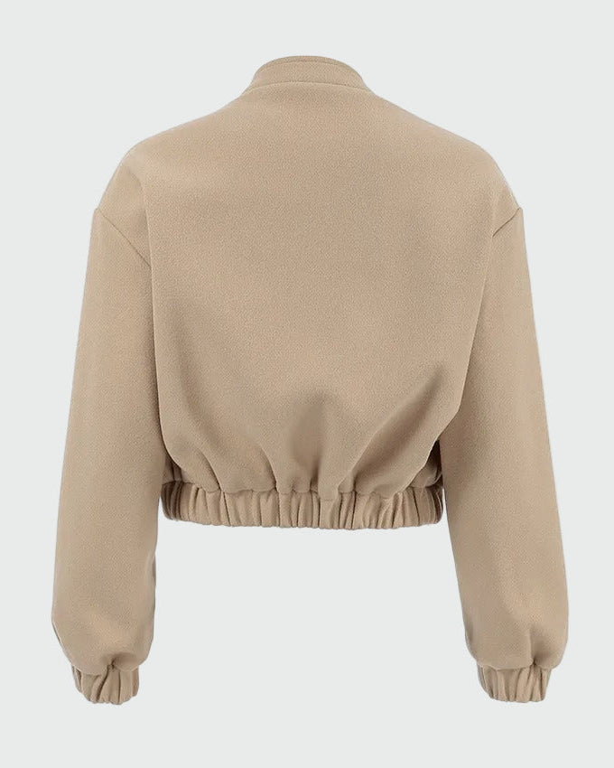 Beige kort bomberjacka med resårkant