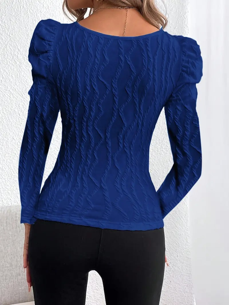 Topp med fyrkantig ringning och puffärmar