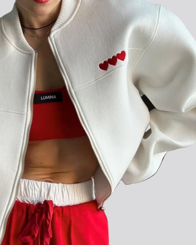 Oversize zipjacka med hjärtdetalj