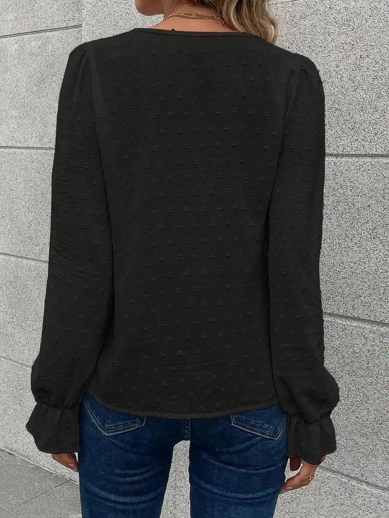 Blus med spetskant och puffärmar