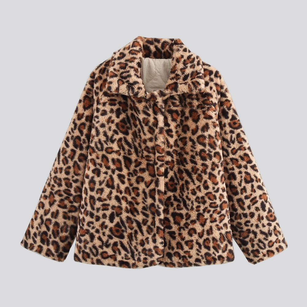 Krämfärgad tvåsidig quiltad jacka med leoparddetaljer