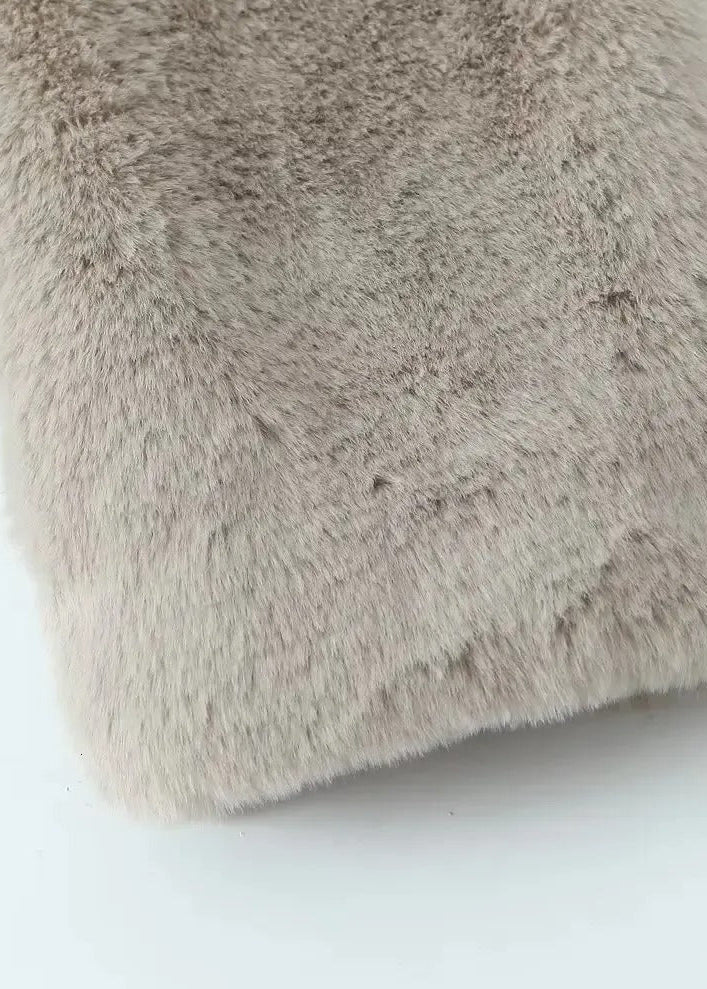 Teddy-kappa med slag och rymlig passform