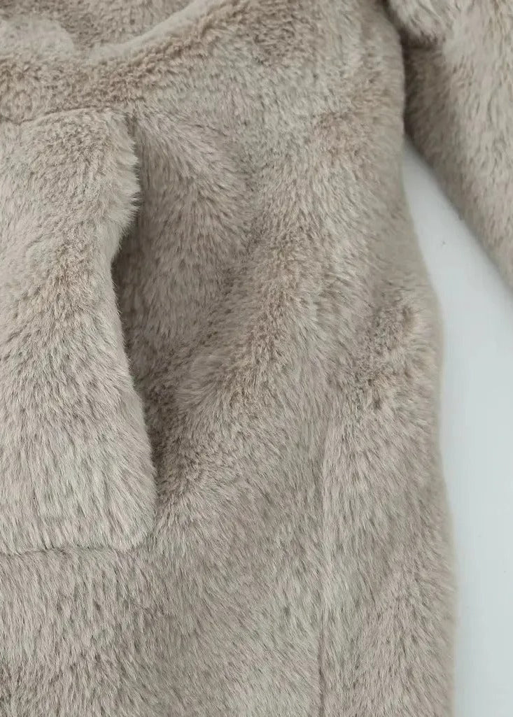 Teddy-kappa med slag och rymlig passform