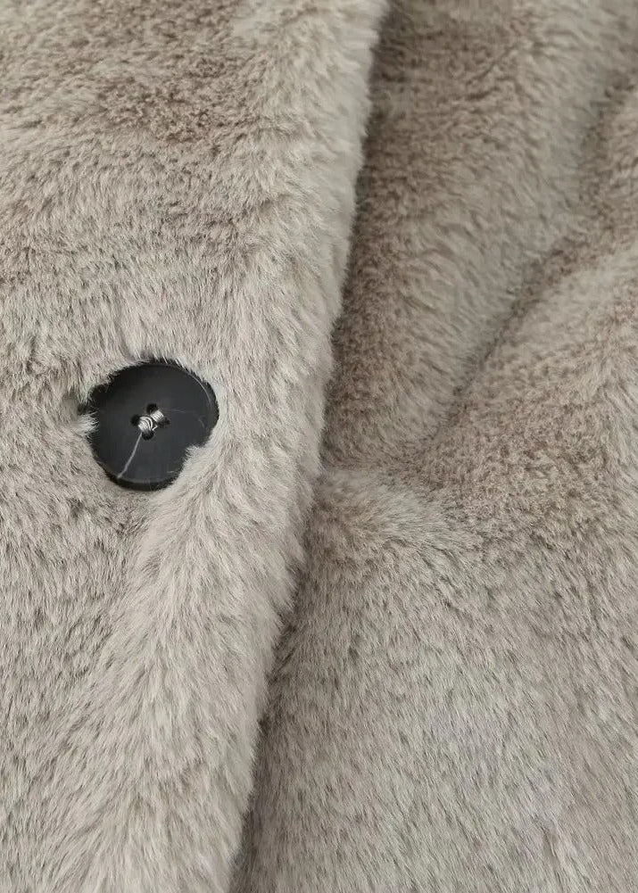 Teddy-kappa med slag och rymlig passform