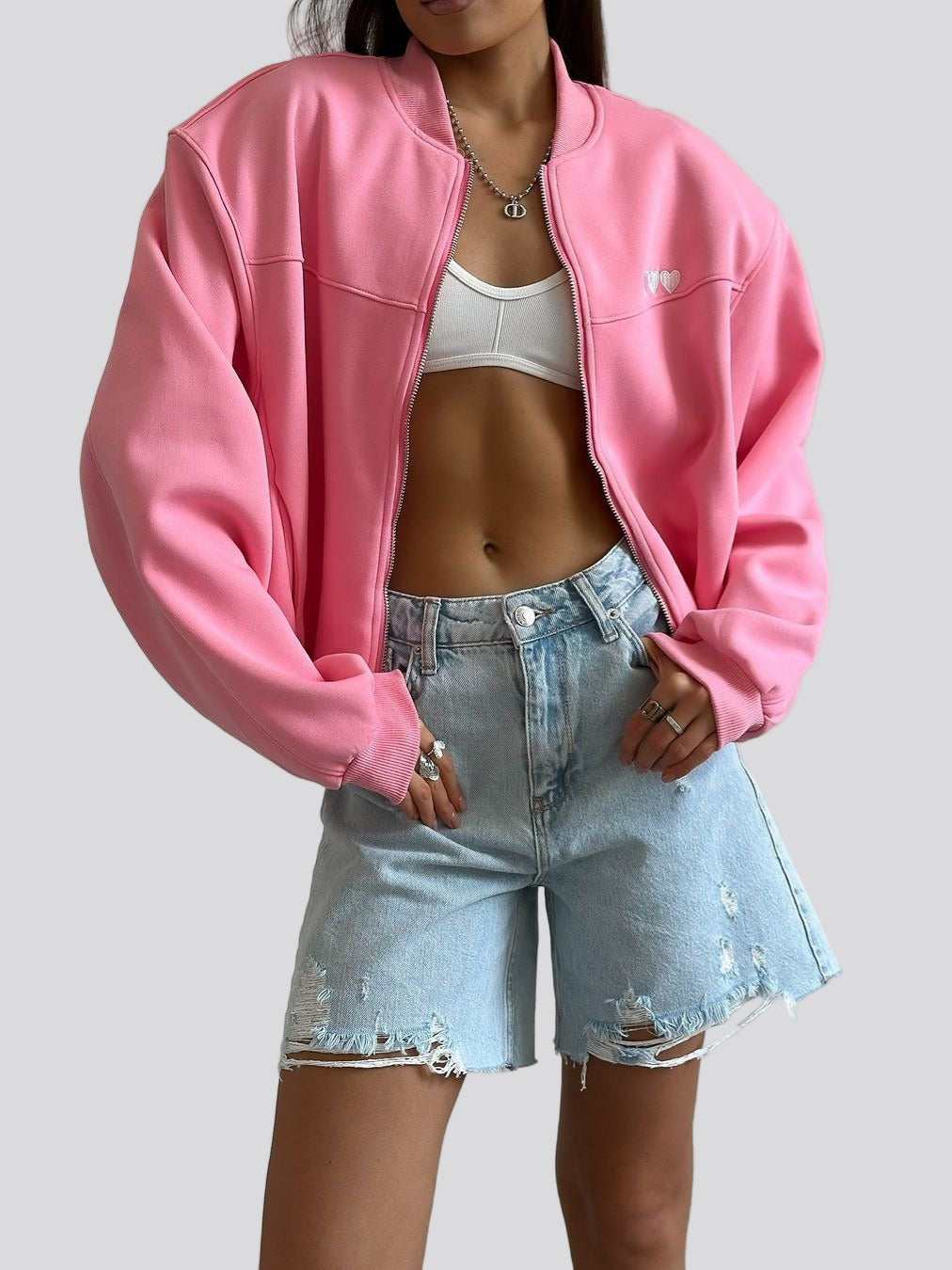 Oversize zipjacka med hjärtdetalj