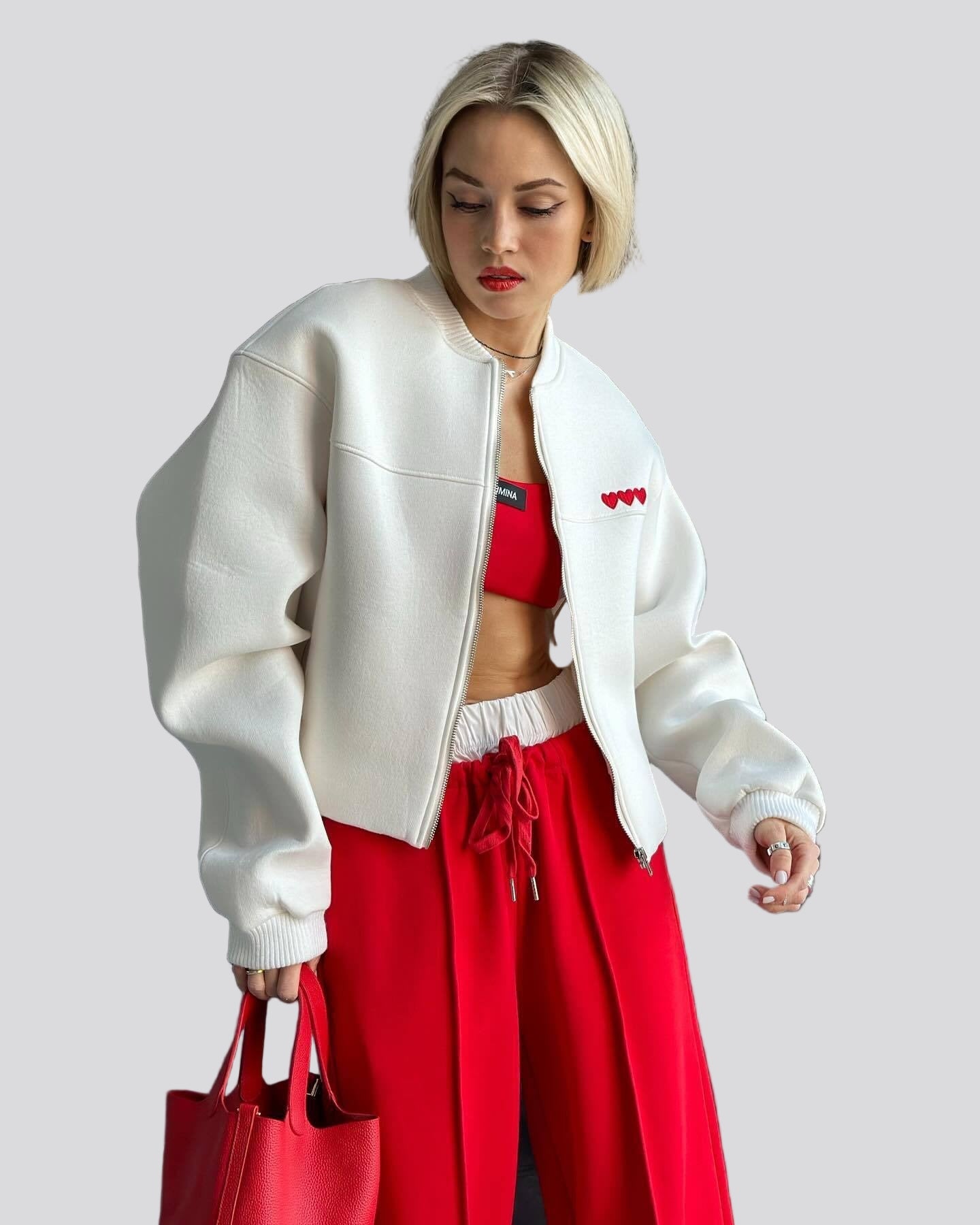 Oversize zipjacka med hjärtdetalj