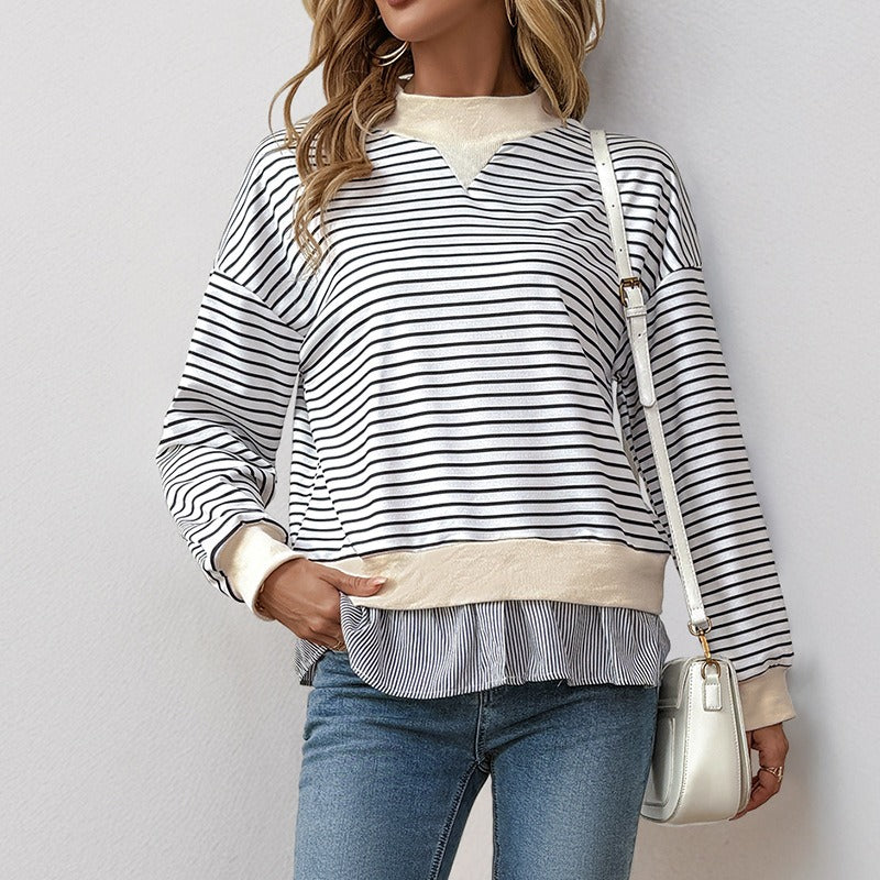 Svartvit randig sweatshirt med beige detaljer