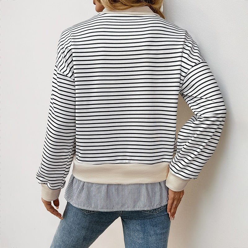 Svartvit randig sweatshirt med beige detaljer