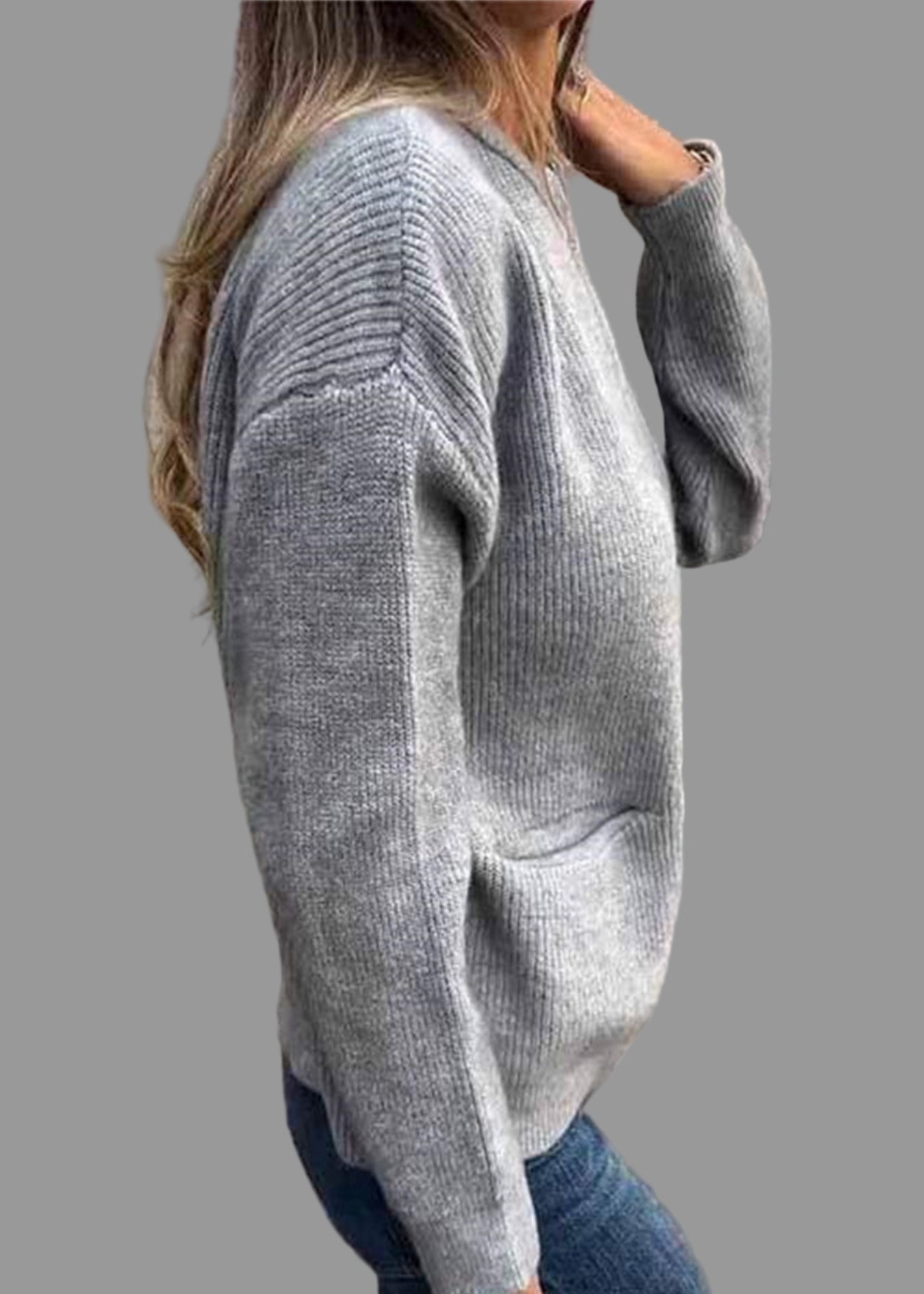 Stickad kofta med dragkedja och fickor