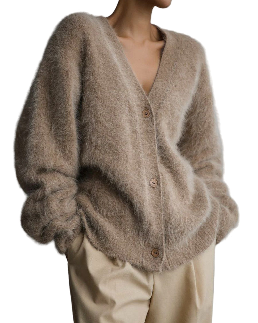 Oversized kofta med knappar och långa ärmar